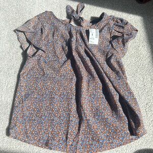 Brown and blue floral blouse with super cute bow detailing in back
